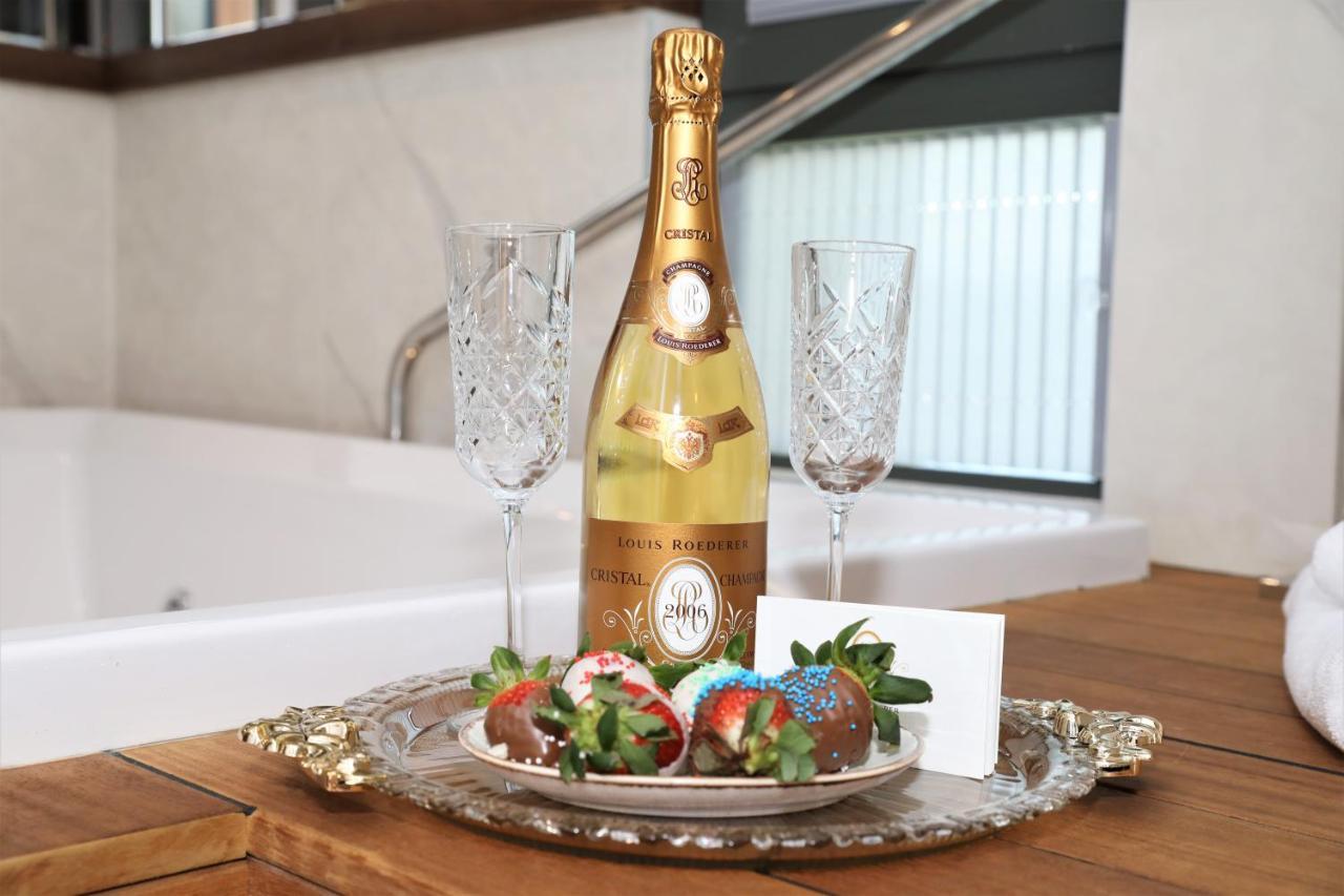 Limak Skopje Luxury Hotel Екстериор снимка A bottle of Dom Pérignon